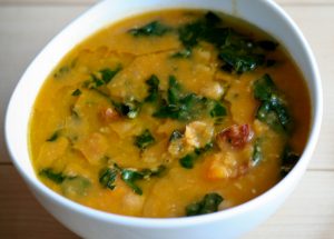 Caribbean garbanzo, chorizo, and spinach soup in a chicken base 