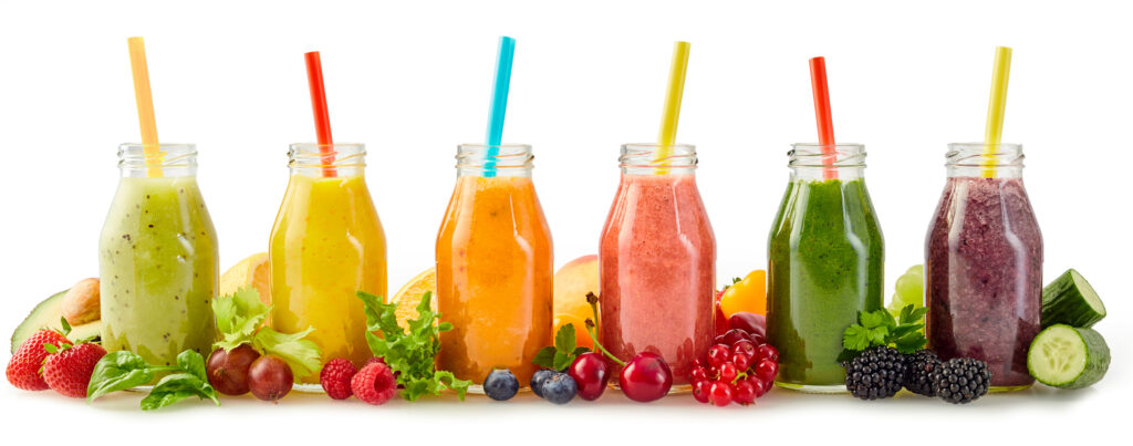 Healthy fresh fruit and vegetable smoothies with ingredients